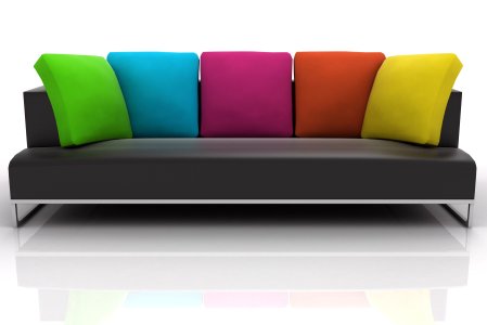 contemporary black and chrome sofa with multi colored cushions - green blue pink orange yellow