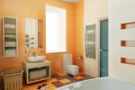 contemporary peach and white bathroom