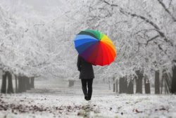 Man with rainbow umbrella