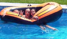 Girls with inflatable boat