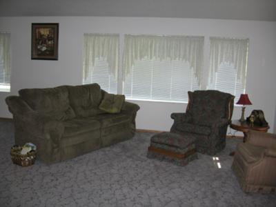 Gray Carpet,  Sage Furniture, White Walls