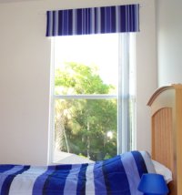 Blue striped padded pelmet