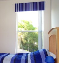 Blue striped padded pelmet